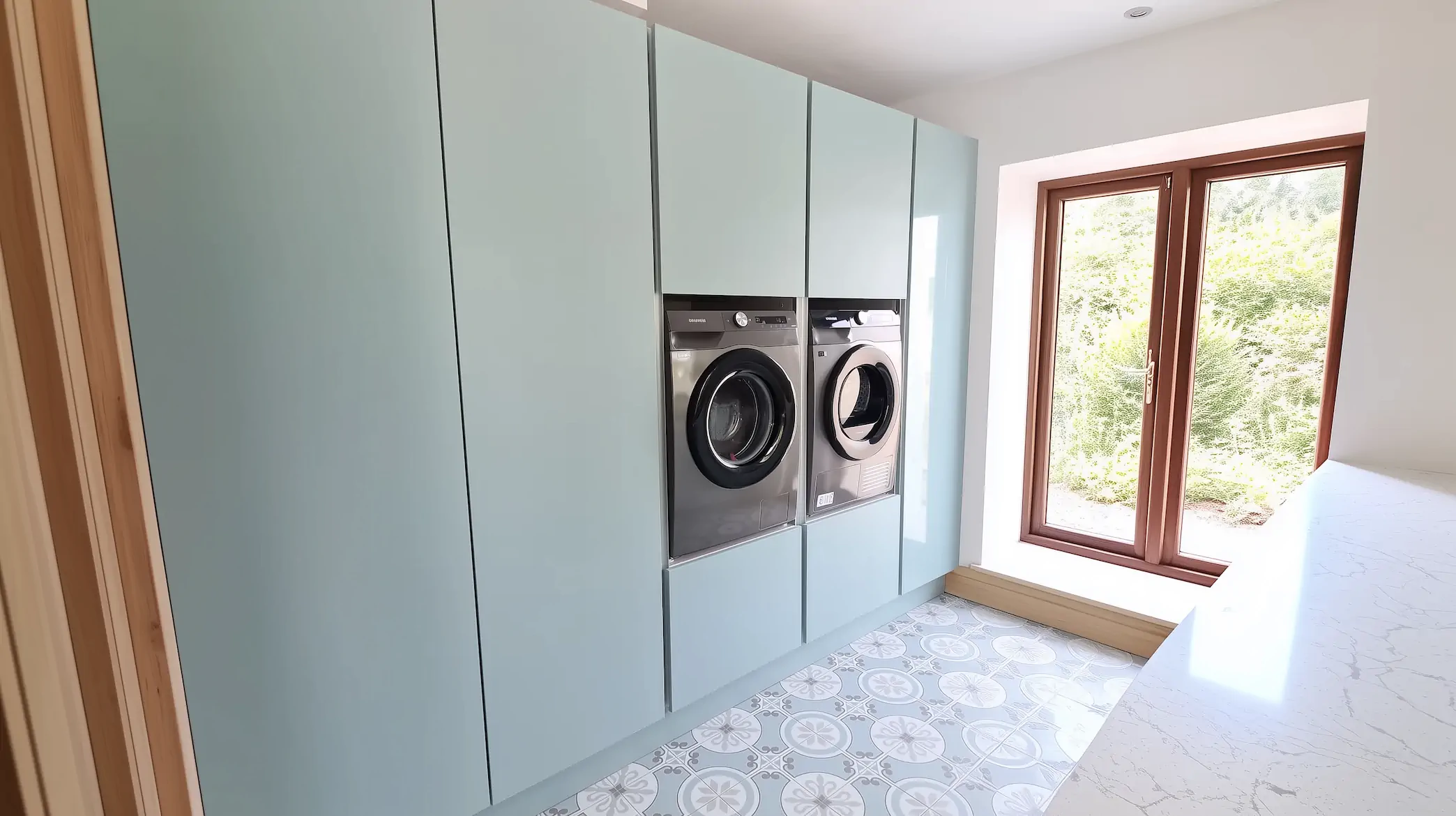 Utility room fit-out with sanitary fittings and fitted storage
